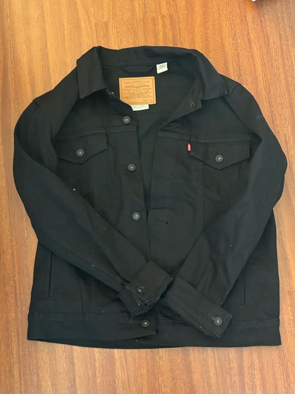 Levi's Black Denim Trucker Jacket with Tan Leather Patch